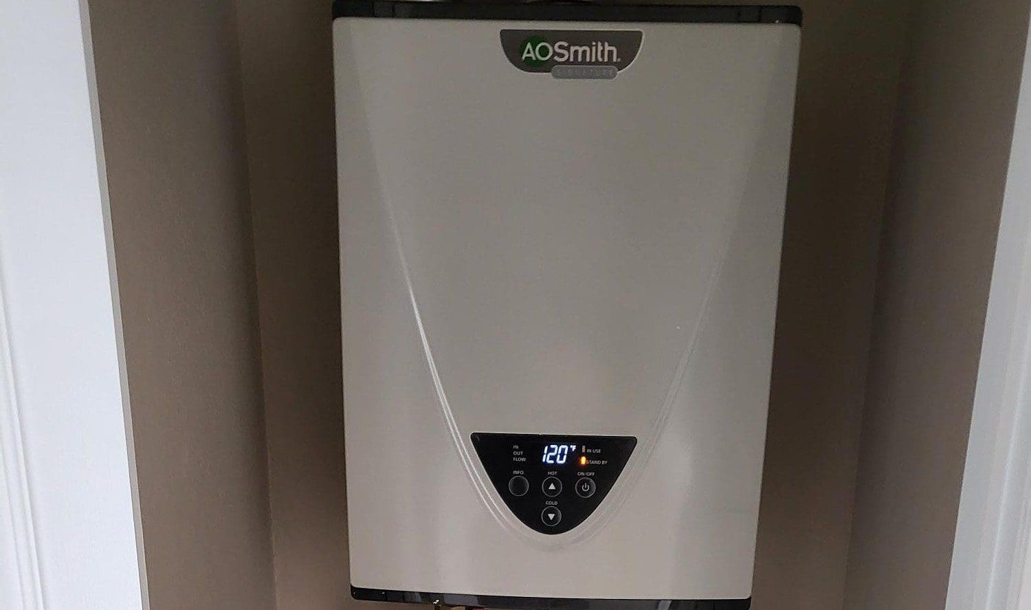 AO Smith water heater with digital temperature display.